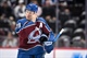 From one MVP to another: Nikola Jokic presents Nathan MacKinnon with Hart Trophy ahead of Avalanche home opener