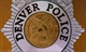 Denver police officer arrested on suspicion of attempting to influence a public servant, insurance fraud