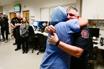 “Full circle”: North Metro Fire captain reunites with hospital staff who saved his life