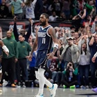 Kyrie Irving's running left-hander at the buzzer lifts Mavs over Nuggets 107-105