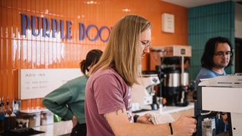 
      
        Denver Non-Profit Coffee Shop Purple Door Opens in...