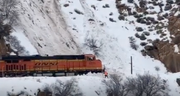 Train pushes through snowslide in Byers Canyon