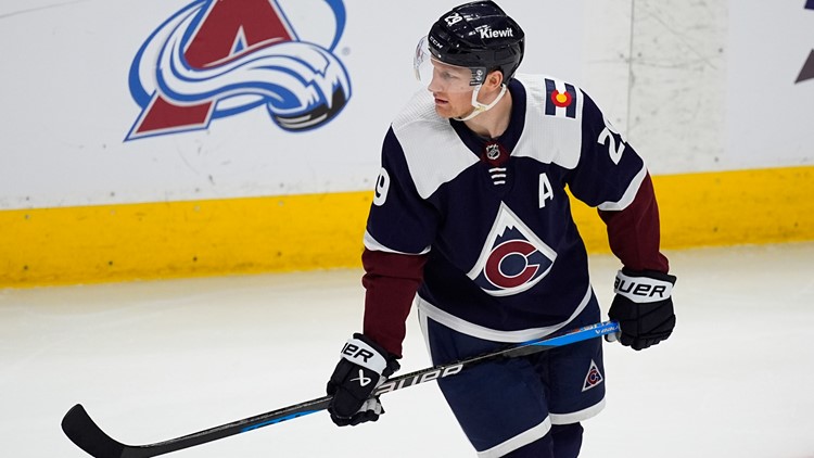 MacKinnon, Trenin help Avalanche rally past Predators 7-4 to clinch playoff berth