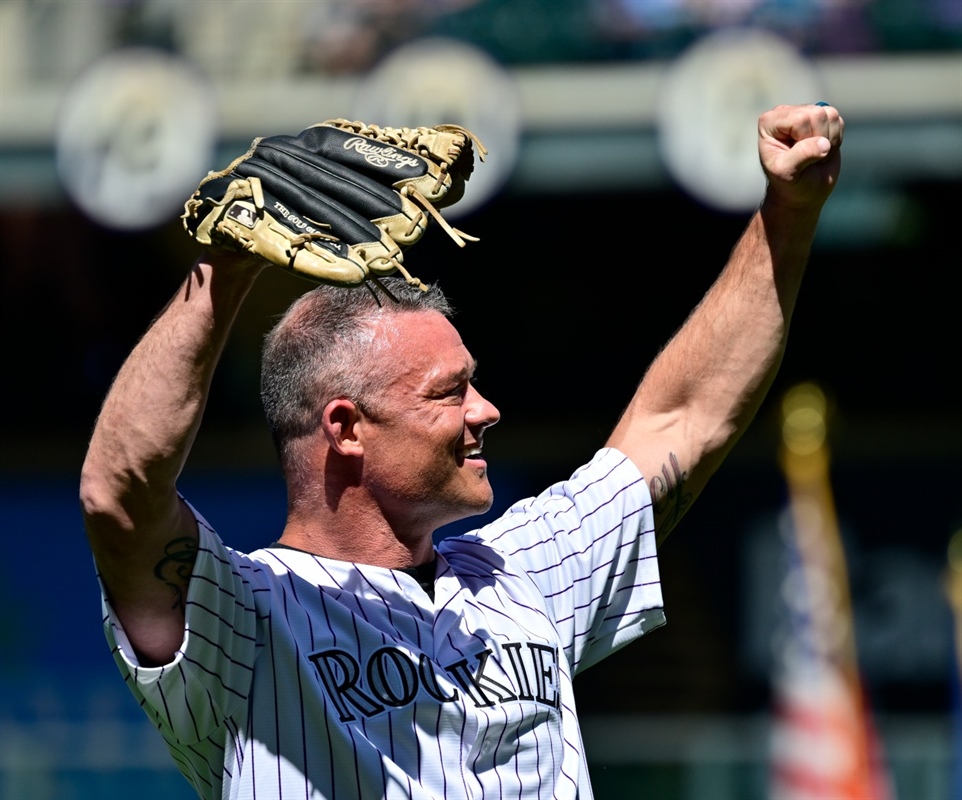 Denver police officer hit by fire truck during Nuggets parade rejoins SWAT team, throws first pitch at Rockies opener