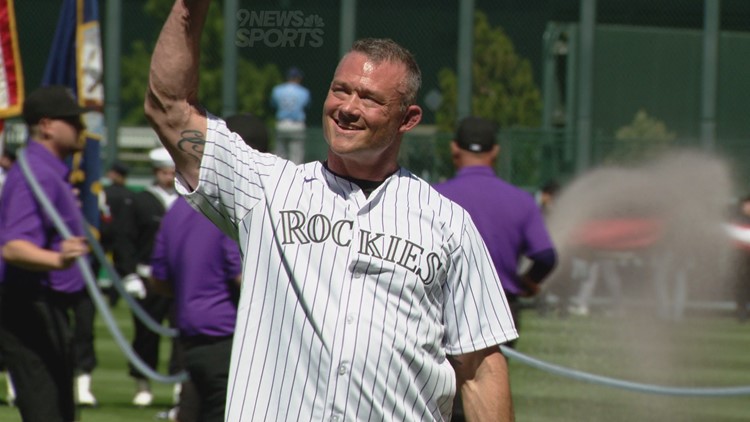 Denver sergeant injured at Nuggets parade throws first pitch at Rockies game