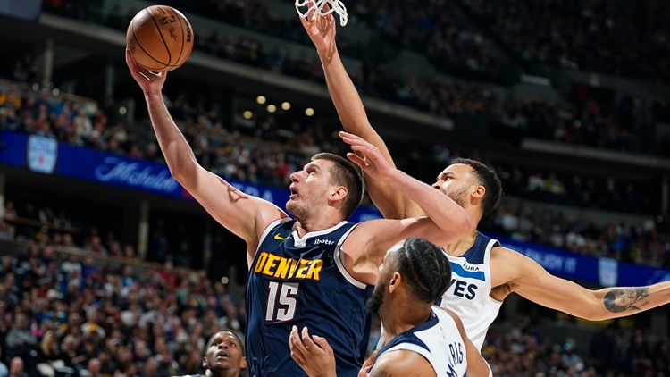 Jokic scores 41 points and leads Nuggets past Timberwolves 116-107 to take lead in West