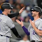 Rockies rout Blue Jays with 20-hit breakout on the road