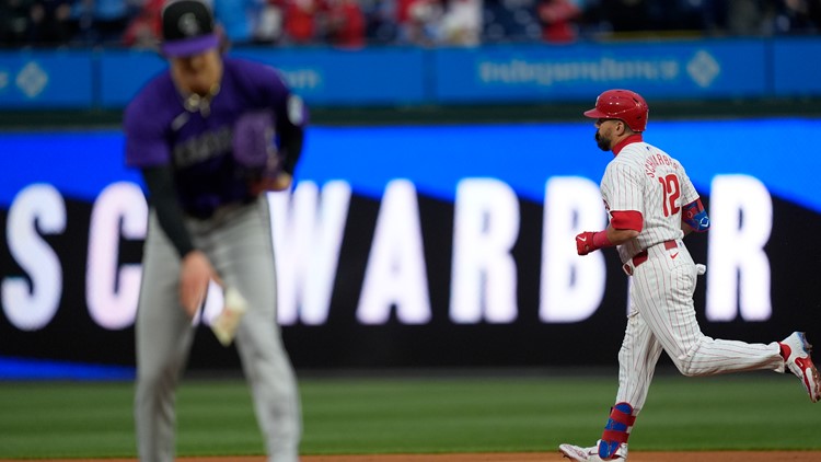 Schwarber homers twice as Phillies finish sweep of Rockies