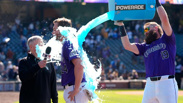 Rockies rally for 2 runs in 10th to beat Mariners 2-1 in 1st game of doubleheader