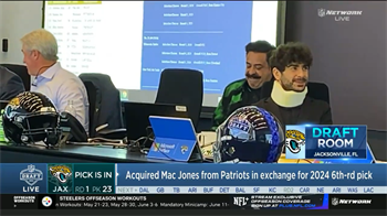 Why Jaguars executive, AEW president Tony Khan is in a neck brace at the NFL...