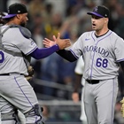 Rockies walk 11 Padres but escape with fifth straight victory