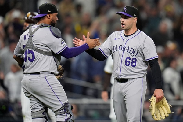 Rockies walk 11 Padres but escape with fifth straight victory