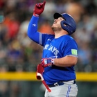 Kirk's pinch-hit double and 3 homers by Toronto power the Blue Jays past the Rockies 13-9