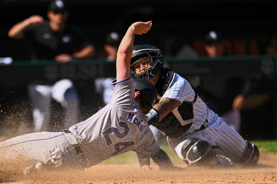 Rockies’ defense delivers in 14-inning win over White Sox
