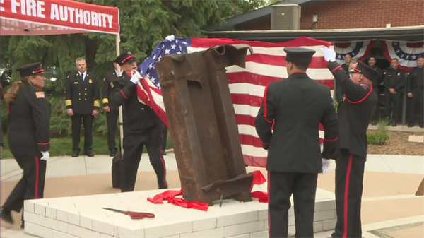 Colorado firefighters who responded on 9/11 escort piece of twin towers to new Fort Collins memorial