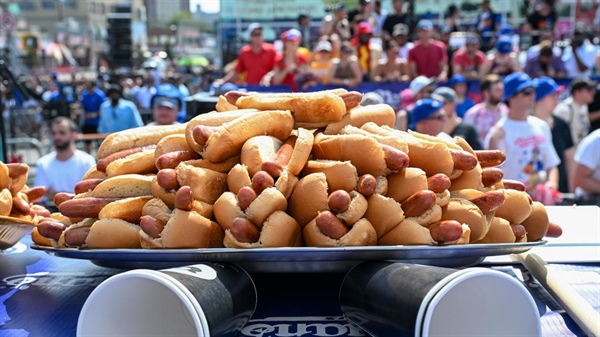 Patrick Bertoletti wins Nathan's Hot Dog Eating Contest. Here's how many calories he consumed.