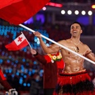 Tonga's viral flag bearer is in Paris, but not to compete at the Olympics