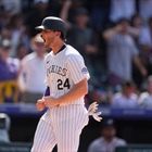 Rockies ride seven-run eighth inning to wild comeback win over Braves in series rubber match