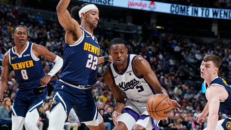 Kings rally from 16 down for 102-98 victory over Nuggets