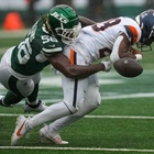 Broncos RB Tyler Badie carted to locker room after hit in New York Jets game