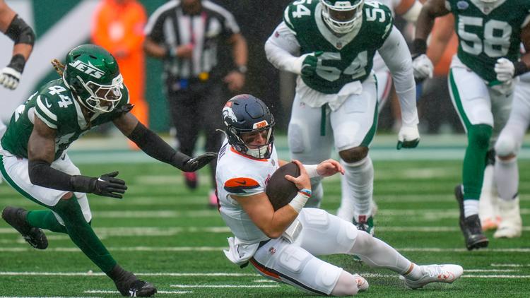 Rain-marred game reaches halftime with Jets leading Broncos, 6-0