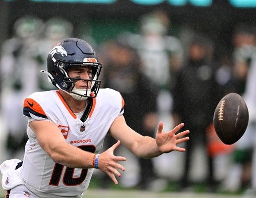 Broncos QB Bo Nix: Rain, wet footballs impacted first half in which he threw...