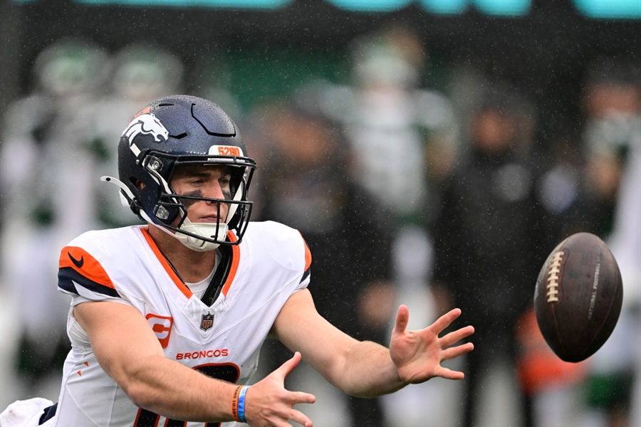 Broncos QB Bo Nix: Rain, wet footballs impacted first half in which he threw for...