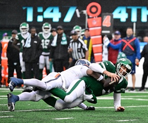 PHOTOS: Denver Broncos top New York Jets 10-9 in a soggy Week 4 of NFL football