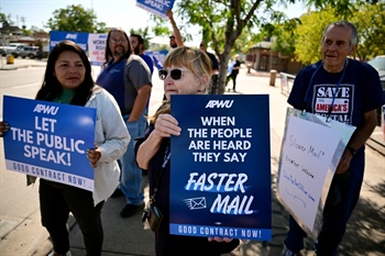 U.S. Postal Service workers rally in Denver to send message they are ready for mail-in ballots in the 2024 presidential election