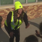 CBS Colorado's Mekialaya White helps students get to school safely as a celebrity crossing guard