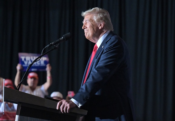 Donald Trump rails against migrants at Aurora rally, vowing to “hunt down” gang members