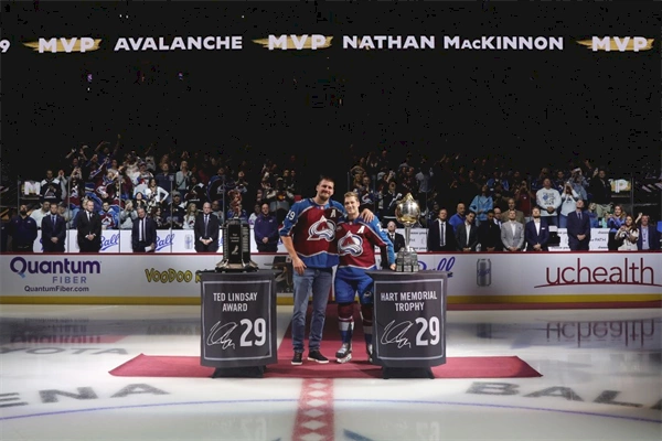 Jokic gives MacKinnon his Hart: The NBA MVP delivers the NHL MVP his trophy.