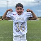 Football team rallies behind 9-year-old hit by car while riding scooter