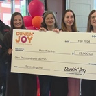 Dunkin' Joy makes big donation to Denver's HopeKids