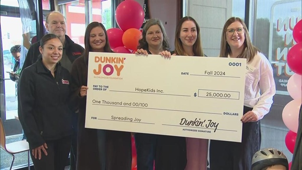 Dunkin' Joy makes big donation to Denver's HopeKids