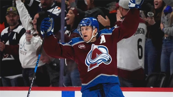 MacKinnon scores in OT to lift Avalanche past Ducks 4-3 for 1st win