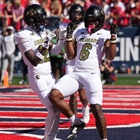 Buffs run over the 'Cats in the desert 34-7