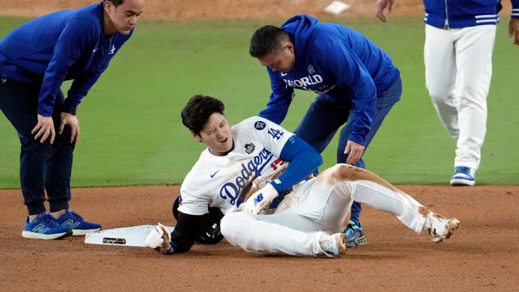 Shohei Ohtani partially dislocates left shoulder during World Series Game 2, status TBD