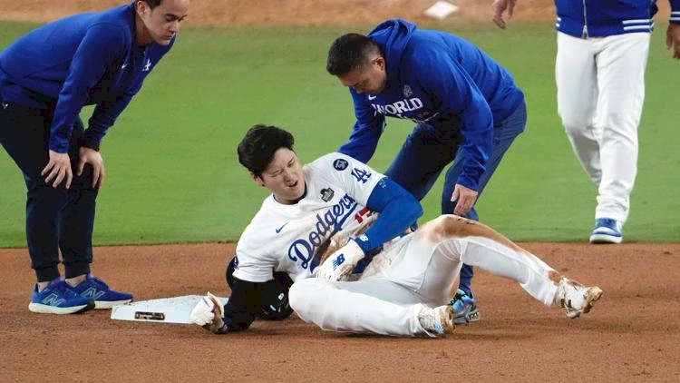 Shohei Ohtani partially dislocates left shoulder during World Series Game 2,...