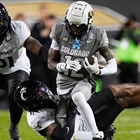 Shedeur Sanders, Travis Hunter help CU beat Cincinnati 34-23 to become bowl eligible