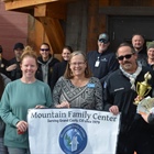 Local organizations help stock Mountain Family Center’s food pantries for the holidays through friendly competition