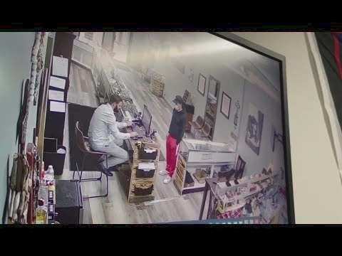 Surveillance video shows armed, dangerous suspect in Centennial jewelry store robbery