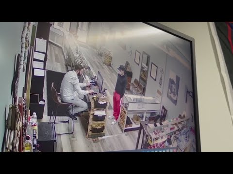 Surveillance video shows armed, dangerous suspect in Centennial jewelry...