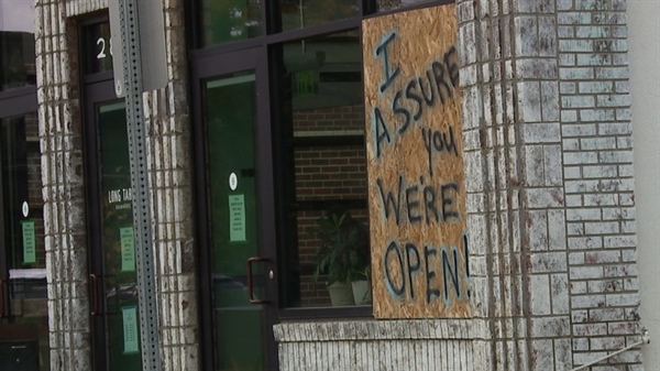 Park Hill business owners, residents find windows shot out Sunday morning