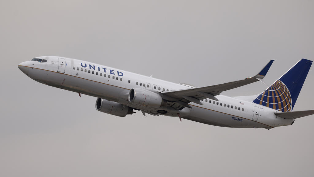 United Airlines passenger attacked while sleeping on flight from San Francisco: "His face was bruised and bloody"