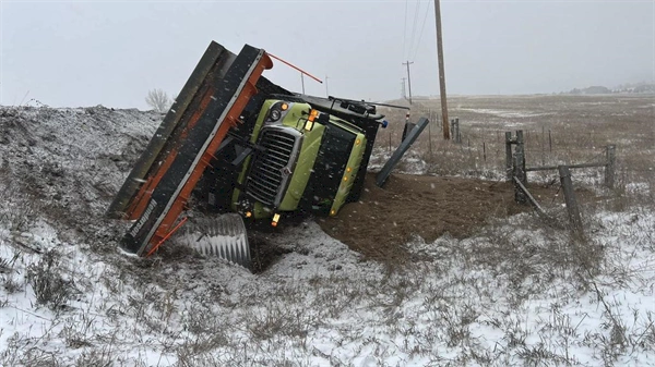 Snowplow rolls over in southern Colorado during icy road conditions