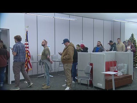 Voters show up at polling center at Lone Tree Library in Douglas County on...