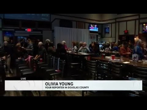 Voters come out to campaign parties despite snow in Douglas County