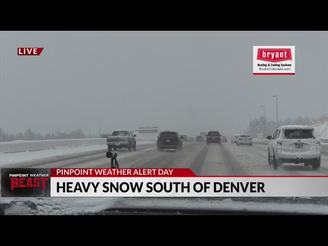 Heavy snow continues to fall south of Denver