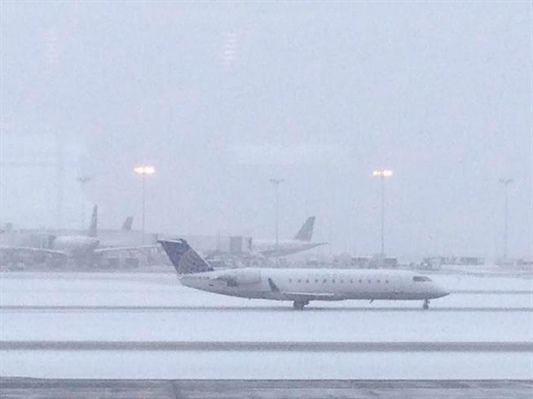 Nearly 600 flights delayed at DIA as snow blankets metro Denver